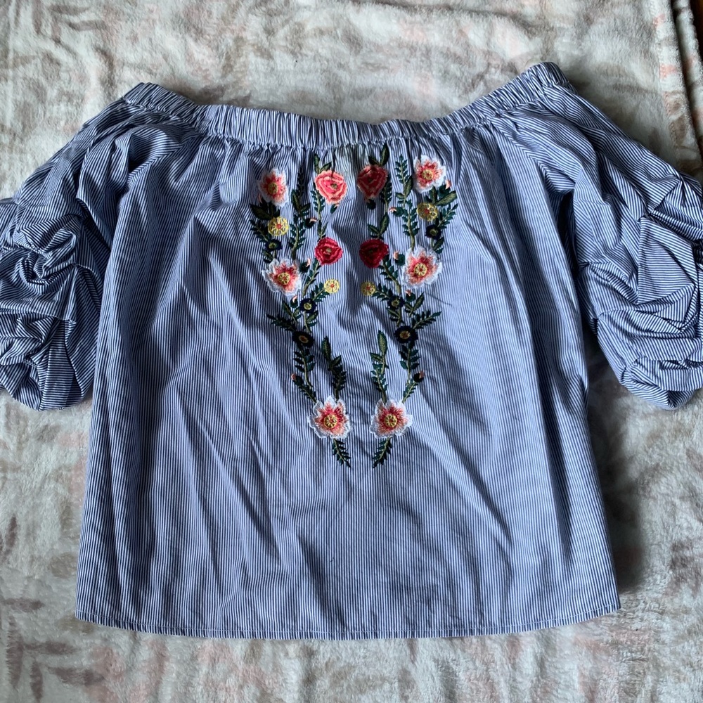 Off the shoulder light blue shirt